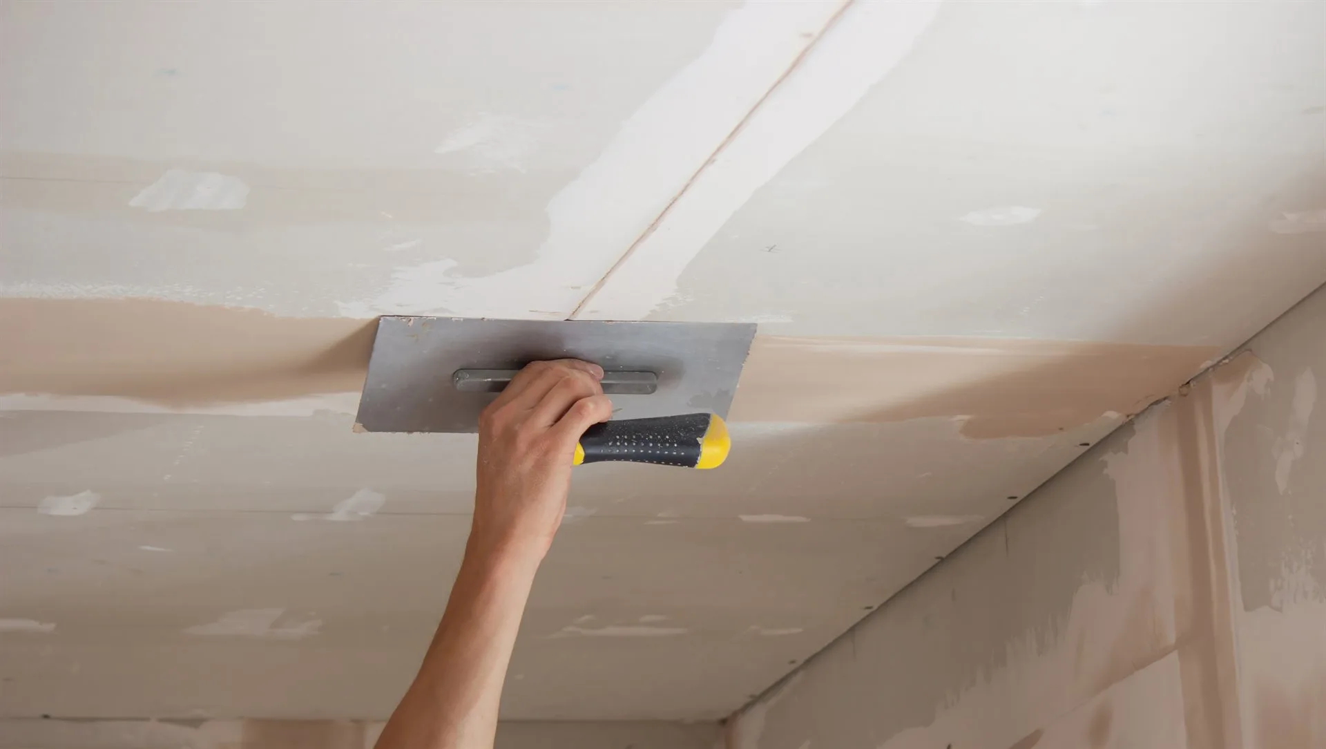 Ceiling Overboarding & Plastering specialists in action