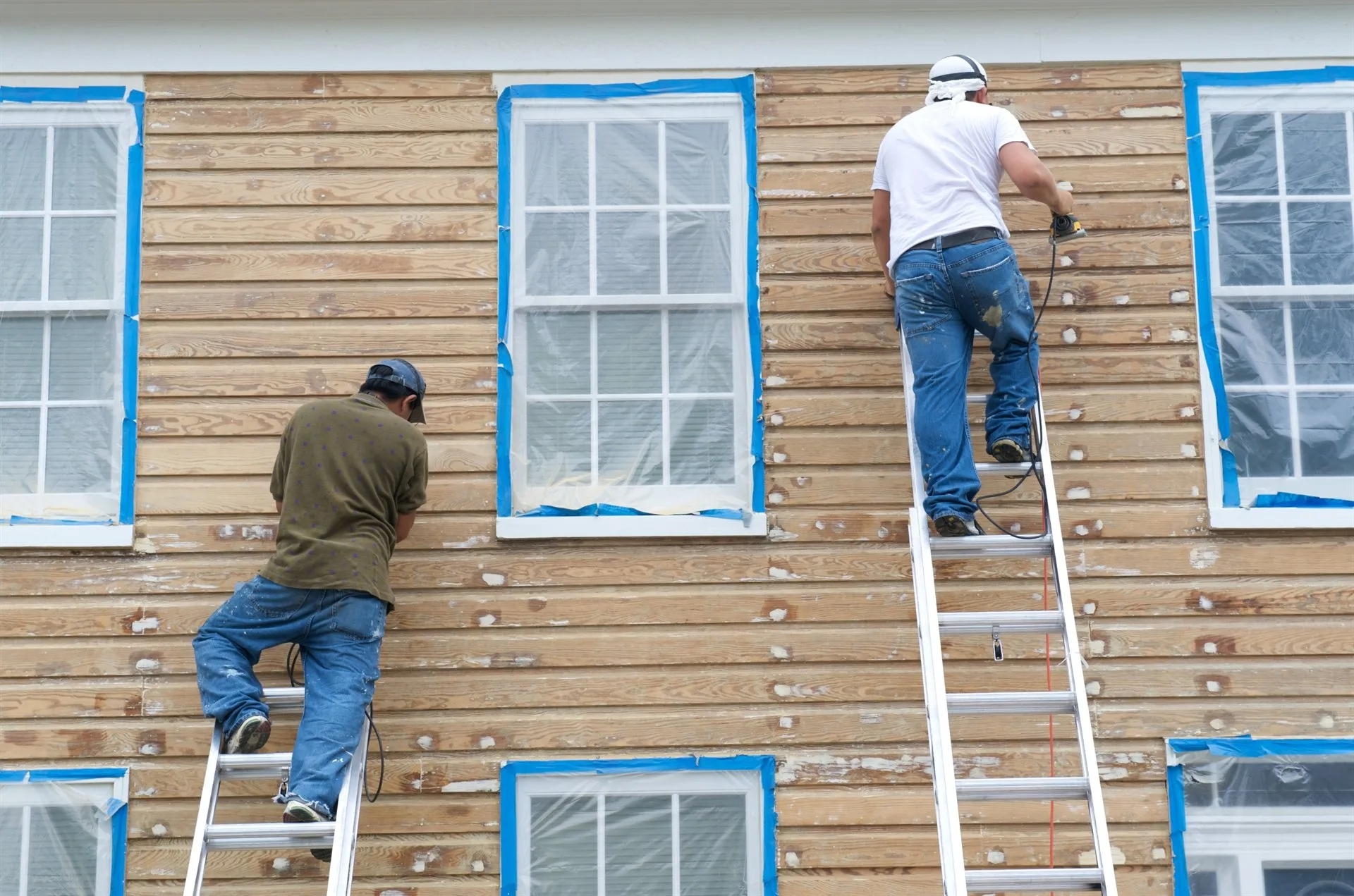 Exterior Woodwork & Masonry Painting specialists in action